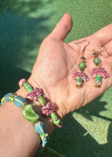 Load image into Gallery viewer, Pink &amp; green ceramic palm tree beaded bracelet n wist with matching earrings &amp; hand over pool