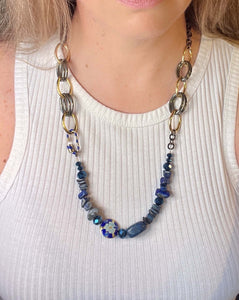 Blue Cloisonné feature bead with flower pattern, Lapis Lazuli gemstones & blue Czech crystal beads on a gunmetal & gold handcrafted adjustable statement  worn with white tank