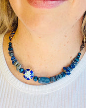 Load image into Gallery viewer, Blue Cloisonné feature bead with flower pattern, Lapis Lazuli gemstones &amp; blue Czech crystal beads on a gunmetal &amp; gold handcrafted adjustable statement chain  worn short as choker