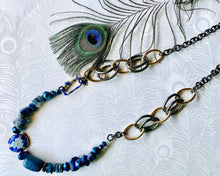 Load image into Gallery viewer, Blue Cloisonné feature bead with flower pattern, Lapis Lazuli gemstones &amp; blue Czech crystal beads on a gunmetal &amp; gold handcrafted adjustable statement chain 