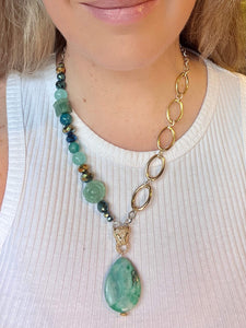 Mint green agate & gold panther head statement necklace  worn with white tank top