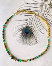Load image into Gallery viewer, green malachite &amp; gold beaded necklace with gold cain on white background with peacock feather