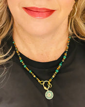 Load image into Gallery viewer, Green Malachite  necklace with 18ct gold plated crystal embellished pendant on model in black top with red lip