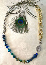 Load image into Gallery viewer, Silver leaf necklace with lapis lazuli blue crystal &amp; freshwater pearl  with gold &amp; silver chain &amp; peacock feather in centre